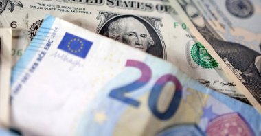 U.S. dollar and Euro banknotes are seen in this illustration taken May 4, 2025. (Reuters Photo)