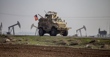 A U.S. military vehicle is seen on a patrol in the countryside near the town of Qamishli, Syria, Dec. 4, 2022. (AP Photo)