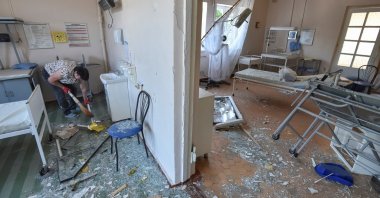 A woman cleans the damaged ward in a hospital which was hit by a Russian missile strike, amid Russia&#039;s attack on Ukraine, in the city of Kamianske, Dnipro region, Ukraine, July 29, 2025. (Reuters Photo)
