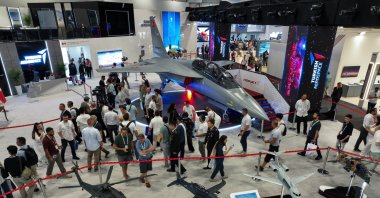 People visit the Turkish Aerospace Industries (TAI) exhibition stand at the International Defence Industry Fair (IDEF), Istanbul, Türkiye, July 26, 2025. (AA Photo)