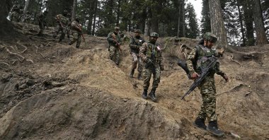 Indian soldiers trek back after a search operation around Baisaran meadow, in Pahalgam, India-ruled Kashmir, April 23, 2025. (AFP Photo)