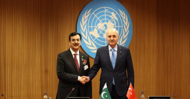 Turkish Parliamentary speaker Numan Kurtulmuş (R) shakes hands with Yusuf Raza Gillani, head of the Senate of Pakistan, Geneva, Switzerland, July 30, 2025. (AA Photo)