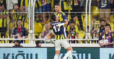 Fenerbahçe’s İrfan Can Kahveci (R) celebrates his goal with teammate Youssef En-Nesyri during a friendly match against Lazio at Chobani Stadium, Istanbul, Türkiye, July 30, 2025. (AA Photo)