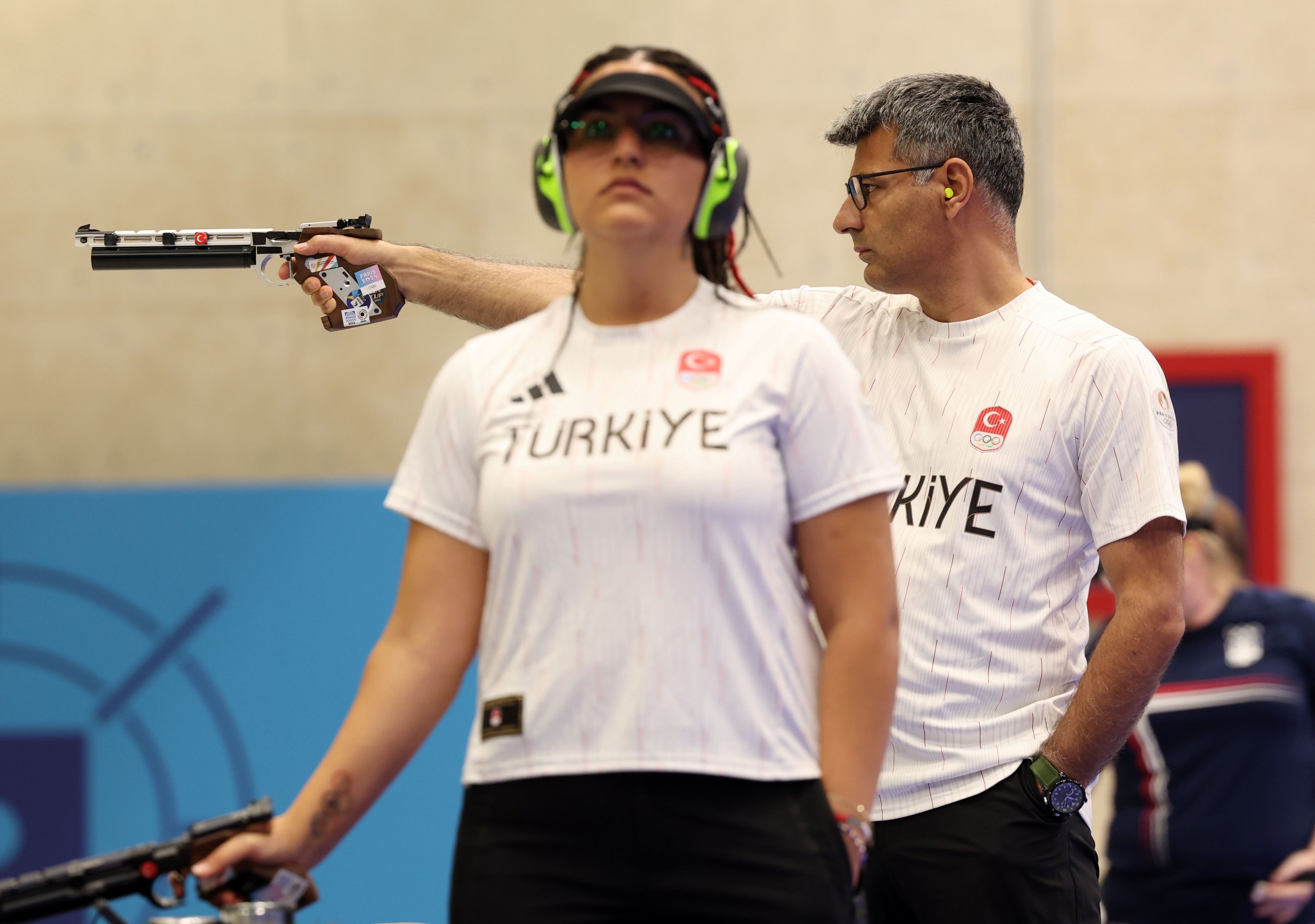 Türkiye's Yusuf Dikeç (R) competes in the shooting 10m air pistol mixed team gold medal match on day four of the Olympic Games Paris 2024 at Chateauroux Shooting Centre, Chateauroux, France July 30, 2024. (Getty Images Photo)