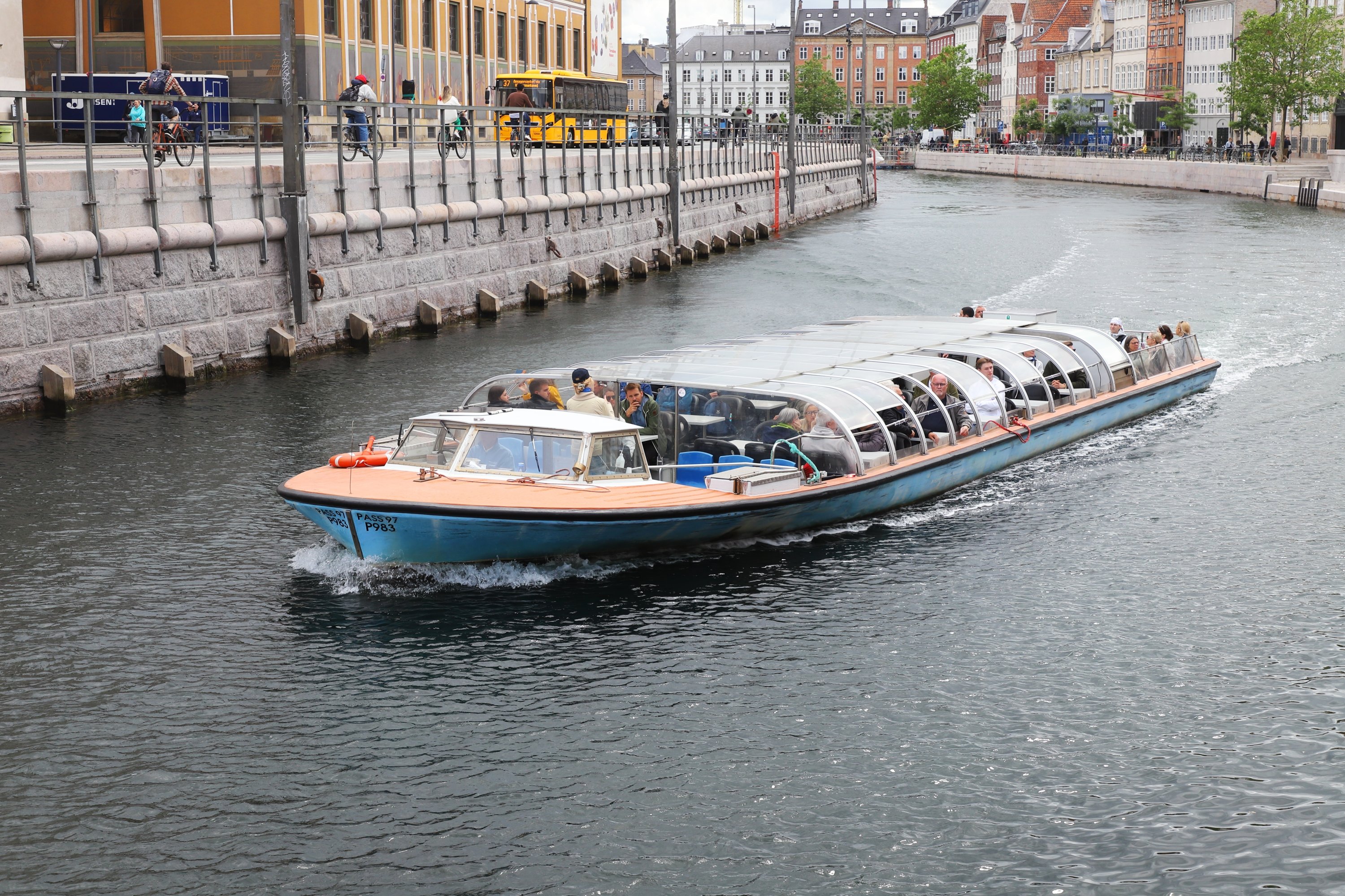 Canal tour boat on the canal at Gammel Strand, Copenhagen, Denmark. (Shutterstock Photo)