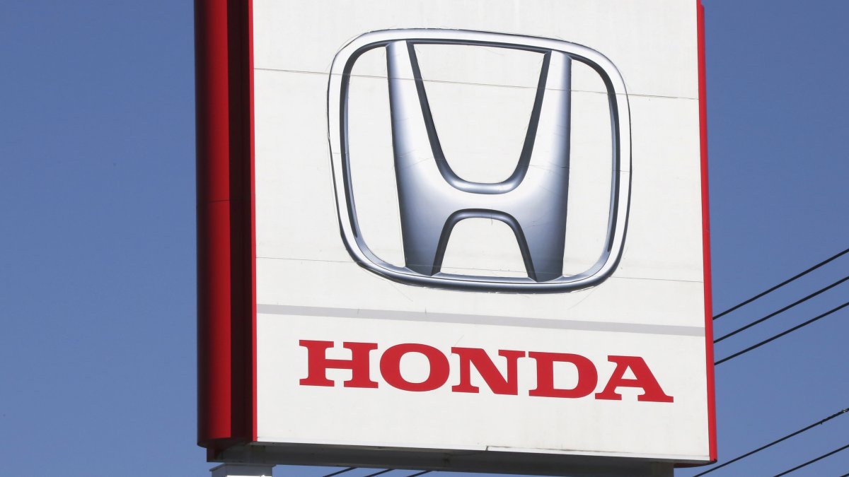 The logo of the Honda Motor Company seen in Yokohama, near Tokyo, Japan, Dec. 15, 2021. (AP Photo)