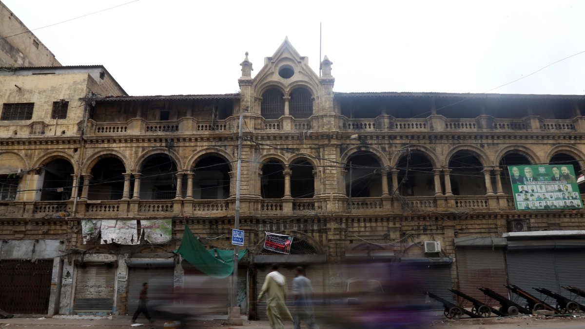 People walk at a closed market during a shutdown strike, in Karachi, Pakistan, 19 July 2025. (EPA File Photo)