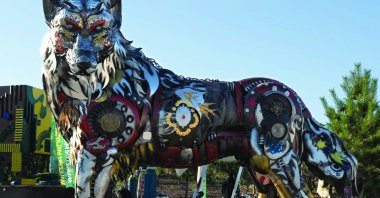 The &quot;Wolf&quot; sculpture, crafted from obsolete machinery and defense equipment, displayed at Aselsan’s Gölbaşı campus, Ankara, Türkiye, July 30, 2025. (Courtesy of Halil Ibrahim Izgi)