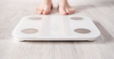 A woman living in the U.S. realized she was being cheated on when she checked the data from the smart scale at home. (Shutterstock Photo)