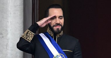 El Salvador&#039;s President Nayib Bukele salutes during the military parade after being sworn in at the National Palace in downtown San Salvador, June 1, 2024. (AFP Photo)