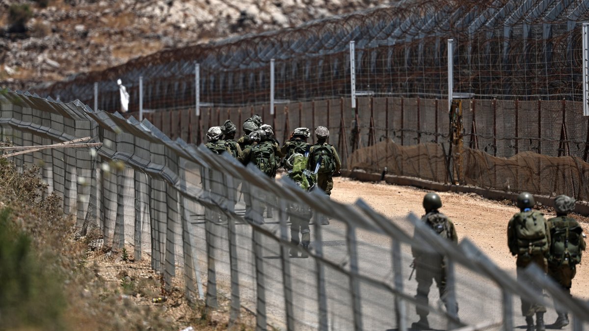 Israeli soldiers patrol at the cease-fire line, near the Israeli-annexed Golan Heights village of Majdal Shams, July 23, 2025. (EPA Photo)