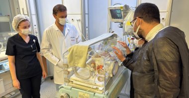 Doctors observe the premature baby recovering inside an incubator following two complex surgeries, Izmir, Türkiye, Aug. 3, 2025. (AA Photo)