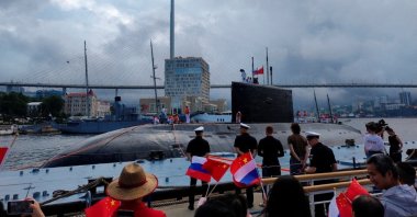 People take part in a ceremony marking the start of the upcoming Russian-Chinese joint naval drills in the Sea of Japan, following the arrival of Chinese military vessels in Vladivostok, Russia, July 31, 2025. (Reuters Photo)