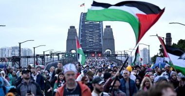 Demonstrators march across the Sydney Harbour Bridge during a pro-Palestinian rally against Israel's actions and the ongoing food shortages in the Gaza Strip, in Sydney, Australia, Aug. 3, 2025. (AFP Photo)