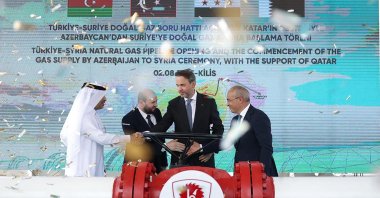 Energy and Natural Resources Minister Alparslan Bayraktar (2R), Minister of the Economy of the Republic of Azerbaijan Mikayil Jabbarov (R), Syrian energy minister Mohammed al-Bashir (2L) and  Director General of Qatar Fund for Development (QFFD) Fahad Hamad Hassan Al-Sulaiti (L) during the Türkiye-Syria Natural gas pipeline opening, in Kilis, Türkiye, Aug. 2, 2025. (AFP Photo)