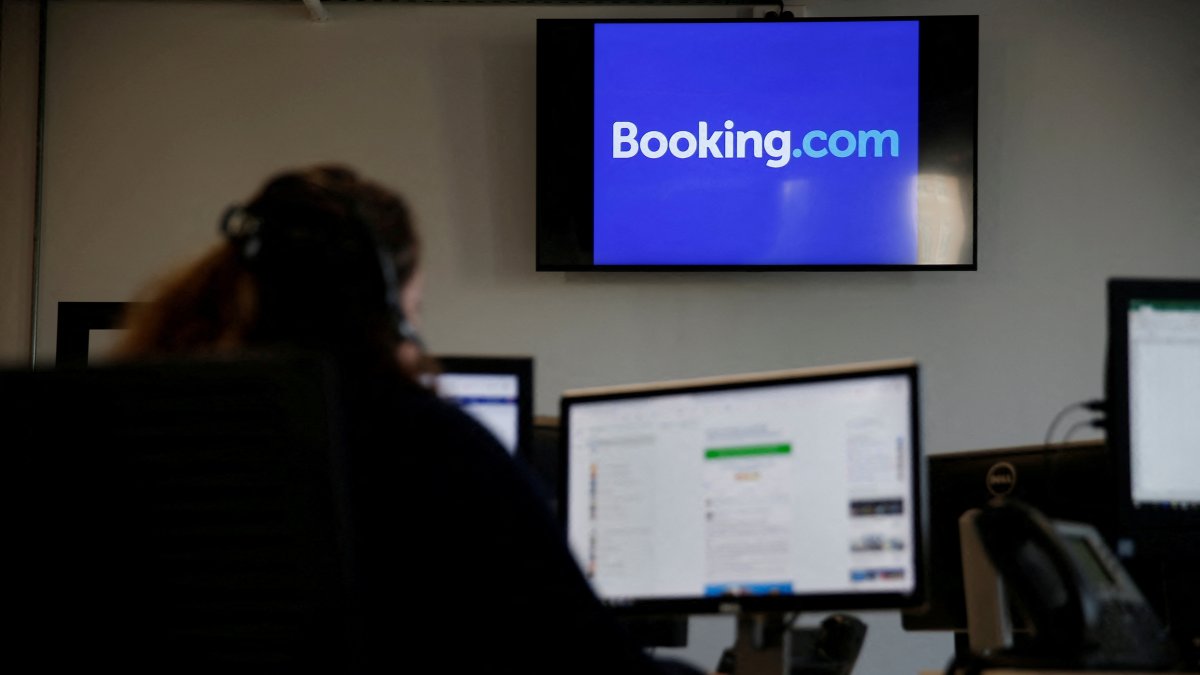 An employee works on his computer at the new Booking.com customer site, Tourcoing, France, Oct. 4, 2019. (Reuters Photo)