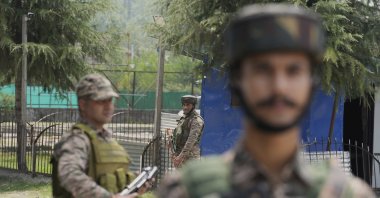 Indian soldiers guard a checkpoint near the site of a gun battle on the outskirts of Srinagar, India-occupied Kashmir, July 28, 2025. (AP Photo)