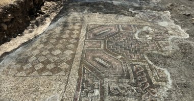 The mosaic displays an emerging Star of David symbol along with a cross motif and Greek inscriptions, Diyarbakır, Türkiye, Aug. 2, 2025. (AA Photo)
