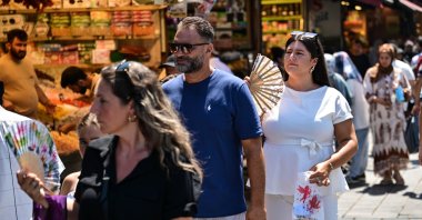 People are seen at a market in Eminönü neighborhood on a hot summer day, Istanbul, Türkiye, July 29, 2025. (AA Photo)