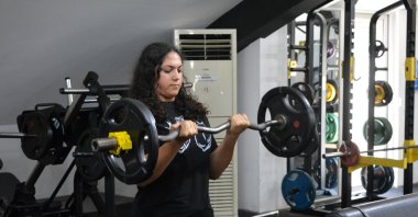 Zehra Olgar, 13, trains with determination at a gym after relocating from earthquake-hit Hatay to Manavgat, Antalya, Türkiye, Aug. 4, 2025. (DHA Photo)