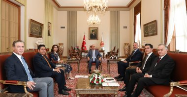 Parliament Speaker Numan Kurtulmuş (C) meets with representatives of parties to discuss the terror-free Türkiye initiative, Ankara, Türkiye, July 18, 2025.• (IHA Photo)