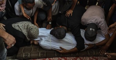 Palestinians mourn over the body of a victim who was killed during Israel&#039;s airstrikes on Gaza, Gaza City, Palestine, Aug. 4, 2025. (AA Photo) 