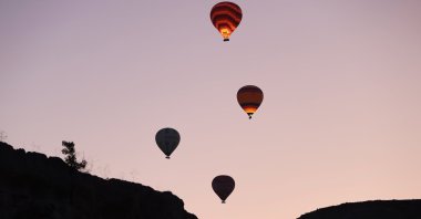 Hot air balloons are seen in the popular tourism hub Cappadocia, central Türkiye, July 14, 2025. (AA Photo)