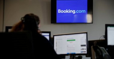 An employee works on his computer at the new Booking.com customer site, Tourcoing, France, Oct. 4, 2019. (Reuters Photo)