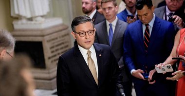 U.S. Speaker of the House Mike Johnson (R-LA) speaks to members of the media outside the House Chamber at the U.S. Capitol, July 23, 2025. (AFP Photo)