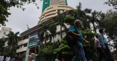 People walk past the Bombay Stock Exchange (BSE) building in Mumbai, India, July 31, 2025. (EPA Photo)