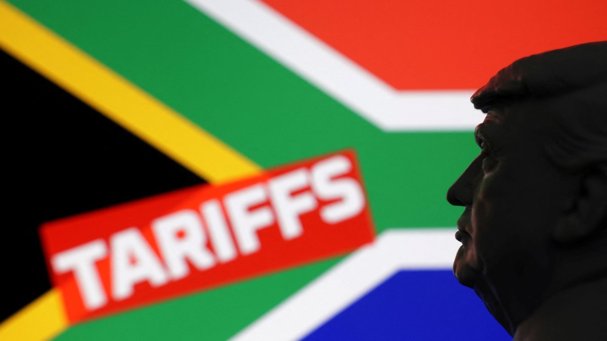 A 3D-printed miniature model of U.S. President Donald Trump, the South African flag and the word "Tariffs" are seen in this illustration taken July 23, 2025. (Reuters Photo)