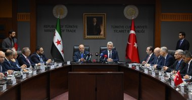 Trade Minister Ömer Bolat (C-R) and Syrian Economy and Industry Minister Mohammad Nidal al-Shaar (C-L) attend a signing ceremony of the founding protocol of the Türkiye-Syria Joint Economic and Trade Committee (JETCO), Ankara, Türkiye, Aug. 5, 2025. (AA Photo)