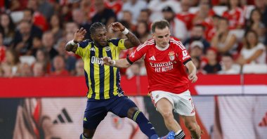 Benfica&#039;s Kerem Aktürkoğlu (R) in action against Fenerbahce&#039;s Fred (L) during the Eusebio Cup match between SL Benfica and Fenerbahce, Lisbon, Portugal, July 26, 2025. (EPA Photo)