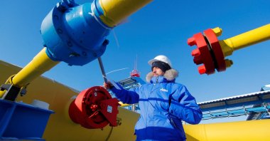 An employee checks a gas valve at the Atamanskaya compressor station, part of Gazprom's Power of Siberia gas pipeline, near Svobodny, Amur region, Russia, Nov. 29, 2019. (Reuters Photo)