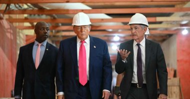 U.S. President Donald Trump (C), Federal Reserve Chair Jerome Powell (R) and Republican Senator Tim Scott visit the Federal Reserve, Washington, U.S., July 24, 2025. (AFP Photo)