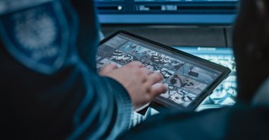 &quot;Security cameras captured the moments when the two suspects entered the store, pretending to be customers interested in buying a game CD.&quot; (Shutterstock Photo)