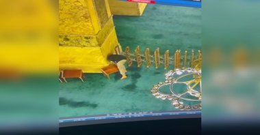 A man is captured on security cameras attempting to start a fire inside the Hagia Sophia Grand Mosque, Istanbul, Türkiye, July 13, 2025. (DHA Photo)