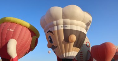 Some 38 balloons from 27 countries take flight at Cappadocia’s Balloon Festival, Cappadocia, Nevşehir, Türkiye, Aug. 7, 2025. (IHA Photo)