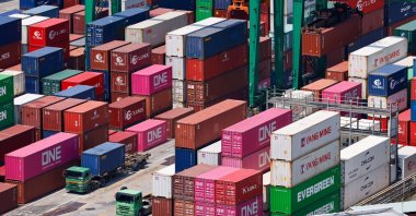 Shipping containers are being moved at the port in Keelung City, Taiwan, Aug. 7, 2025. (EPA Photo)