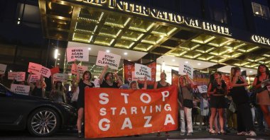 People in support of "If Not Now," a Jewish pro-Palestine organization, protest U.S. President Donald Trump's involvement in the Israeli-Palestinian conflict and the starvation happening in Gaza, in front of the Trump Hotel, New York, U.S., Aug. 4, 2025. (EPA Photo)