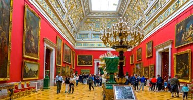 Visitors explore the State Hermitage Museum, St. Petersburg, Russia. (Shutterstock Photo)