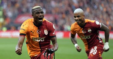Galatasaray&#039;s Victor Osimhen celebrates with his teammate Mario Lemina after scoring against Antalyaspor at the RAMS Park, Istanbul, Türkiye, March 14, 2025. (IHA Photo)