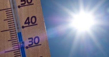 A thermometer shows 38 degrees Celsius in the sun, Sieversdorf, Germany, Aug. 19, 2012. (EPA Photo)