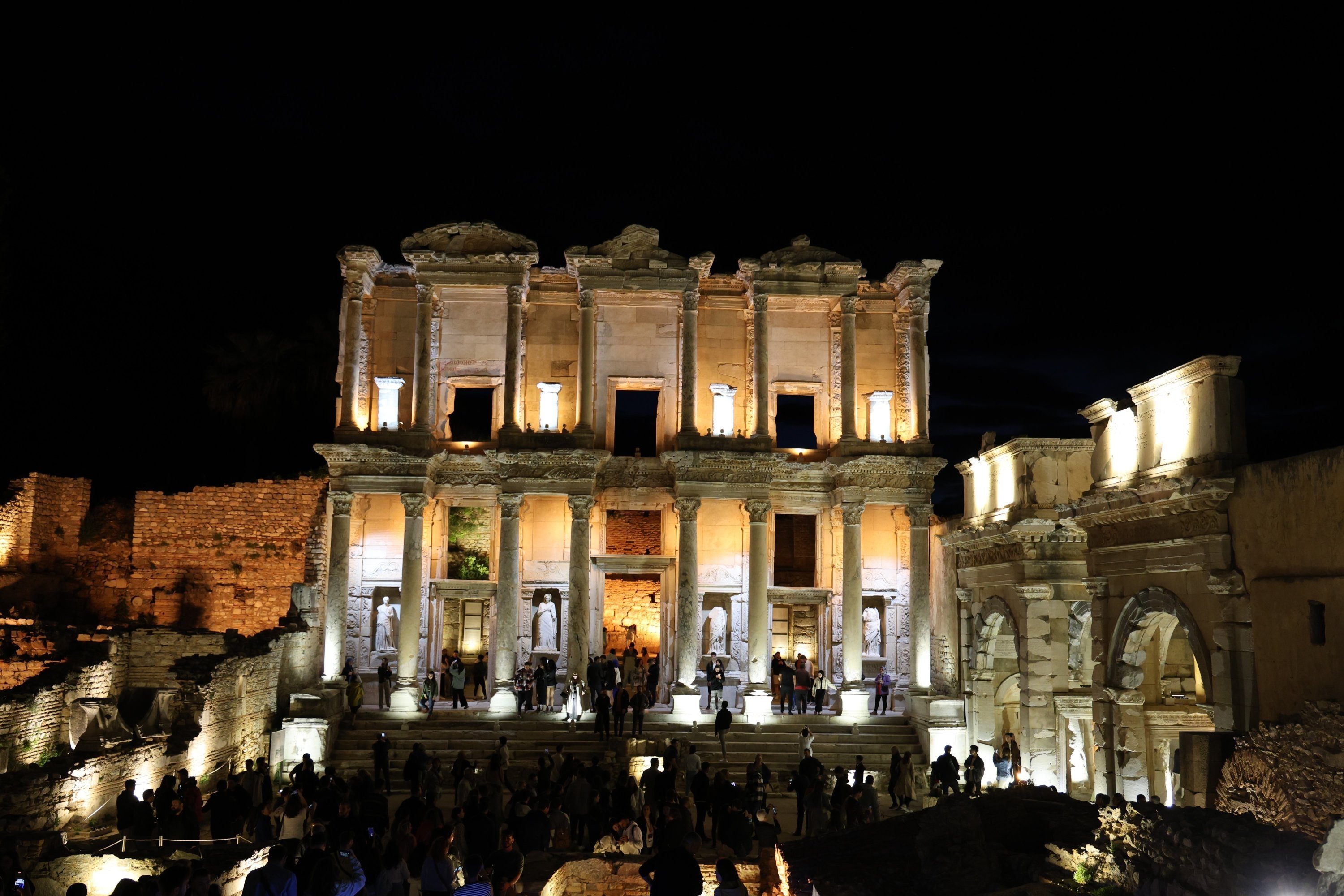 People visit the ancient city of Ephesus as part of the newly launched nighttime museum initiative, Izmir, western Türkiye, April 4, 2024. (IHA Photo)