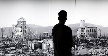A visitor looks at a huge picture of Hiroshima devastated by the world&#039;s first atomic bombing at the Hiroshima Peace Memorial Museum, Hiroshima, western Japan, Aug. 5, 2025. (EPA Photo)