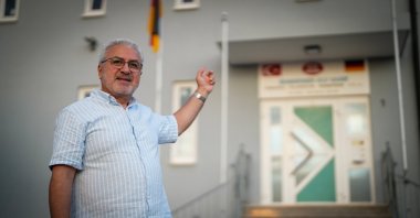A Turkish resident Ercan Topak poses for the camera during an interview, Heitersheim, Germany, Aug. 7, 2025. (AA Photo)