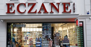 A person walks by a pharmacy, Istanbul, Türkiye, Jan. 3, 2019. (Shutterstock Photo)