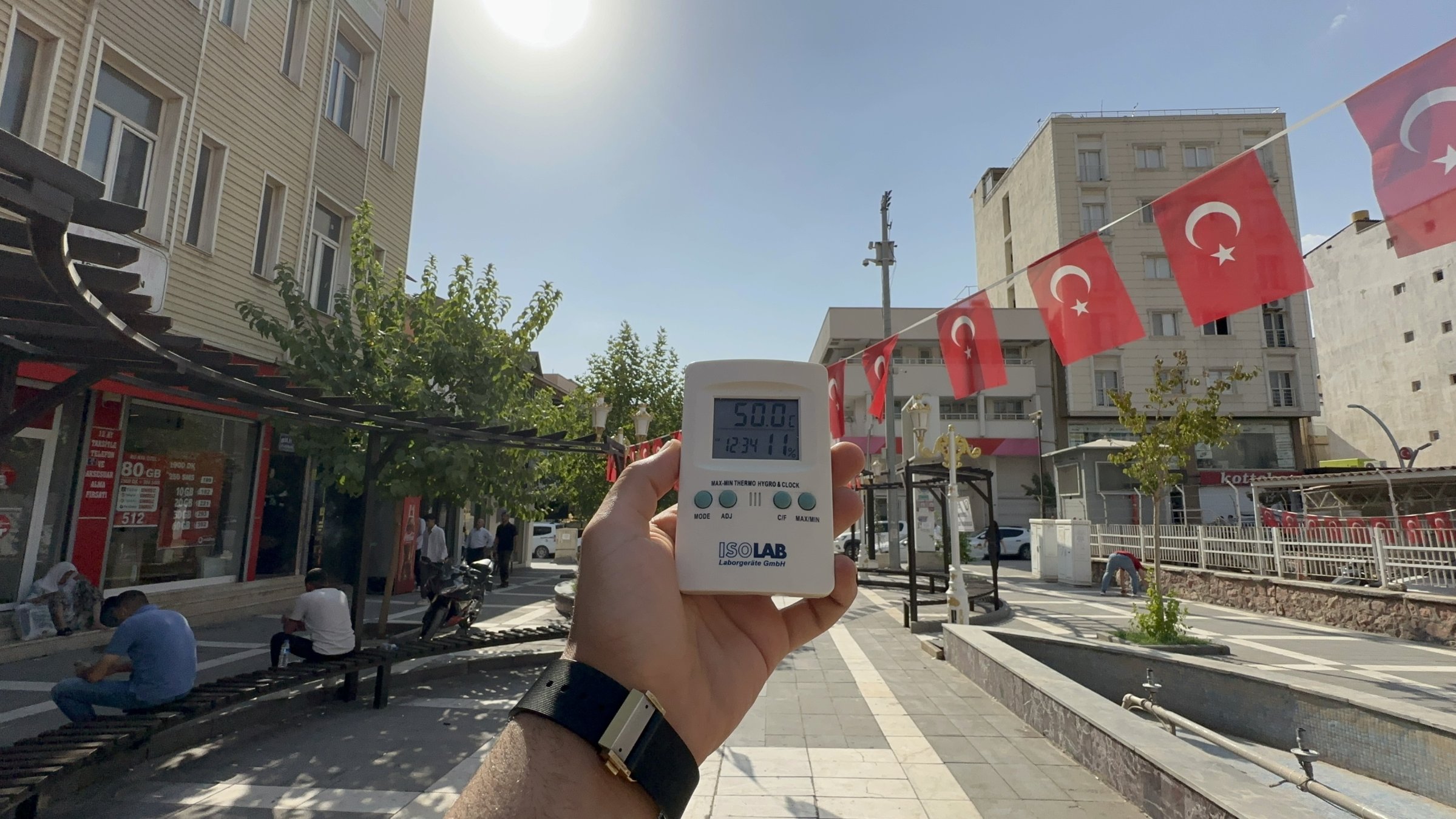 A thermometer reads 50 degrees Celsius as the town’s usually busy streets fall silent during extreme heat, in Silopi, eastern Şırnak province, Türkiye, July 25, 2025. (DHA Photo)