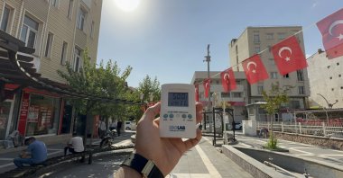A thermometer reads 50 degrees Celsius as the town’s usually busy streets fall silent during extreme heat, in Silopi, eastern Şırnak province, Türkiye, July 25, 2025. (DHA Photo)