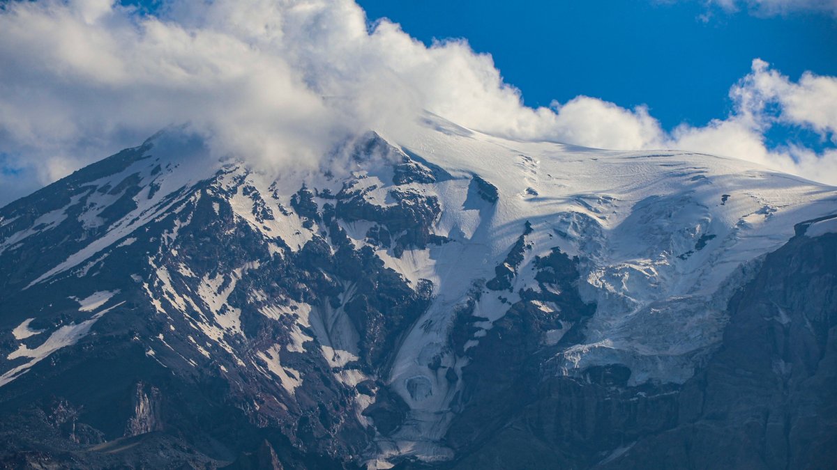 The snow-covered peak of Mount Ağrı, Türkiye’s highest mountain, surrounded by shrinking glaciers, Ağrı, Türkiye, Aug. 9, 2025. (AA Photos)